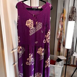 Purple printed sleeveless dress. Unique design. Very flattering.